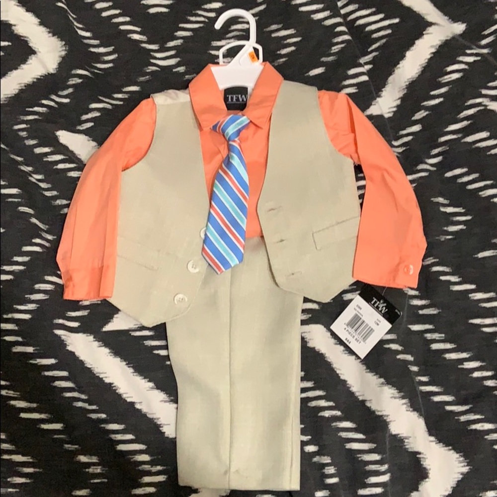 TFW dressy button up shirt, pants, vest and tie.